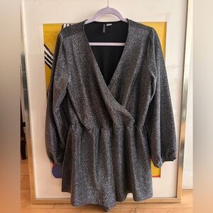 Shimmering fabric sparkles, perfect for a night out.